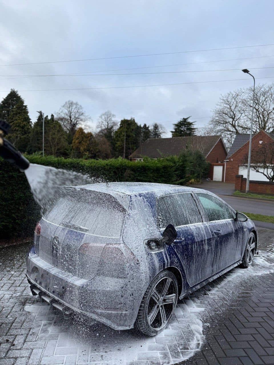 Snow foam pre-wash process on a vehicle exterior